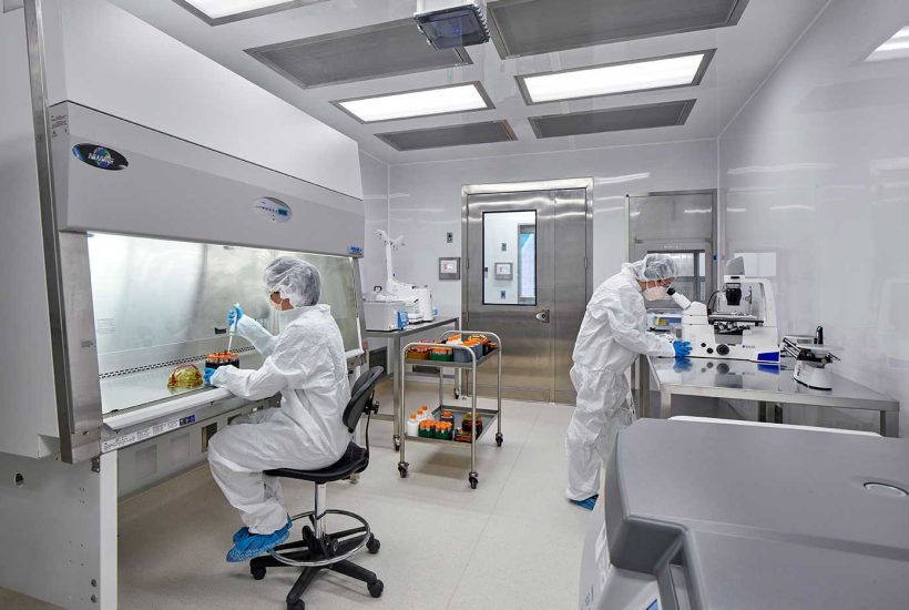 NIH DTM Germfree modular facility cell therapy ISO 7 cleanroom People working in a modular facility