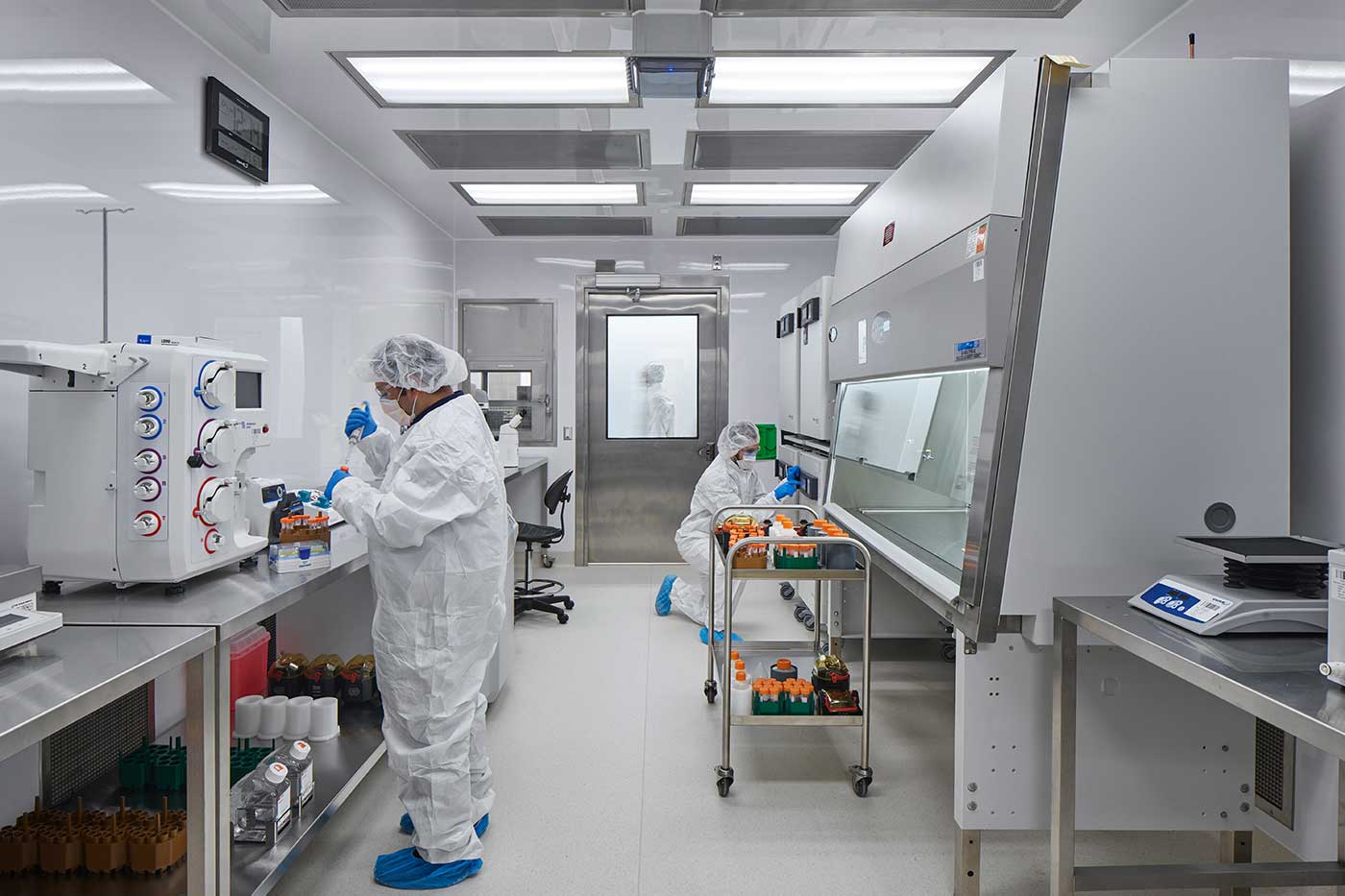 People working in one module of the cell therapy facility