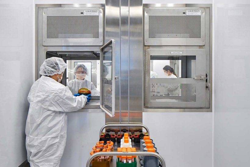 NIH DTM Germfree modular facility material transfer People moving samples into a pass-through box