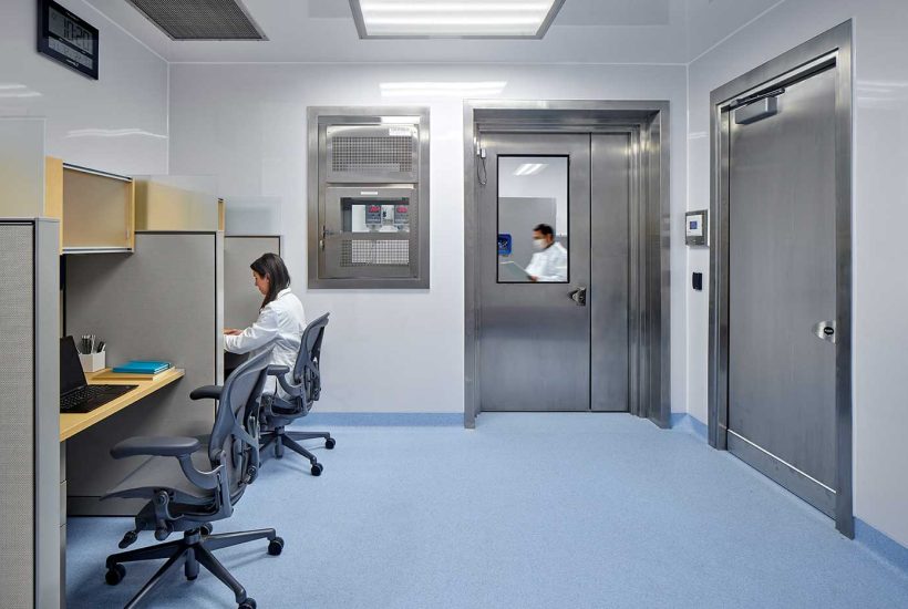 NIH DTM Germfree modular facility support space People working in a modular facility