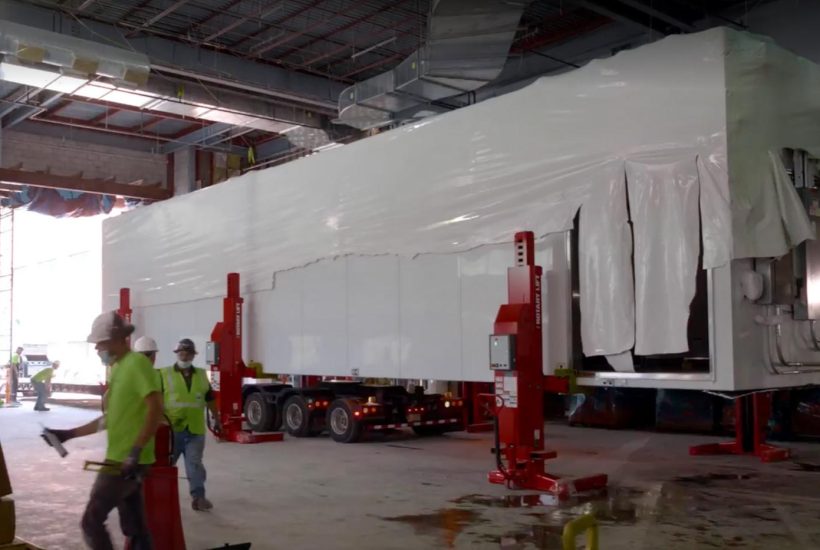 Moving modules into the Vibalogics facility Moving modules to create the Vibalogics modular BSL-2LS cGMP facility