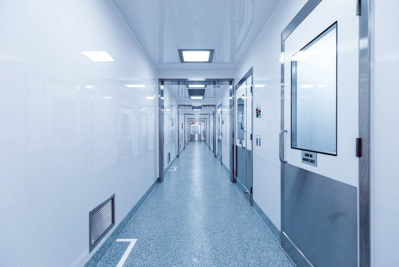 Vibalogics Facility Corridor Vibalogics modular BSL-2LS cGMP facility Corridor with wall and vent on the left and multiple doors on the right