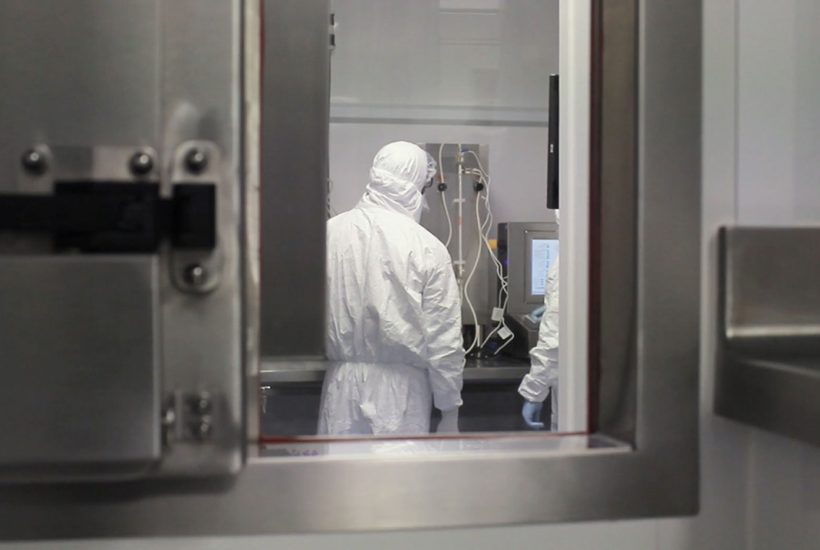 act-4 Mobile cGMP Cleanroom for ACT: scientists in sterile environment
